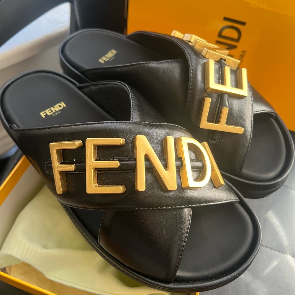 Leather unisex sandal. Very nice soft leather Gold hardware.